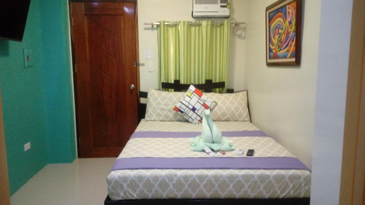 Ea Apartelle - Metro Виган Экстерьер фото
