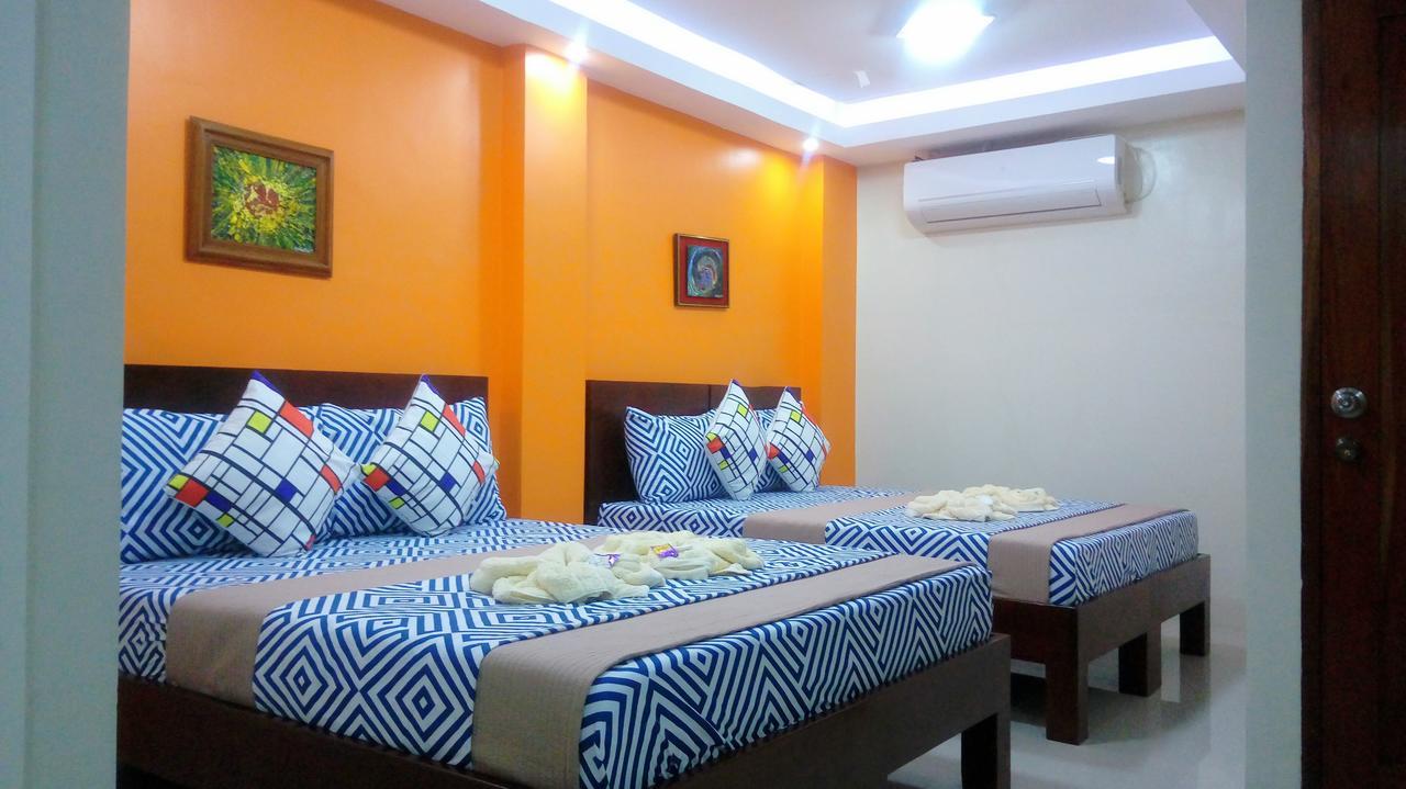 Ea Apartelle - Metro Виган Экстерьер фото