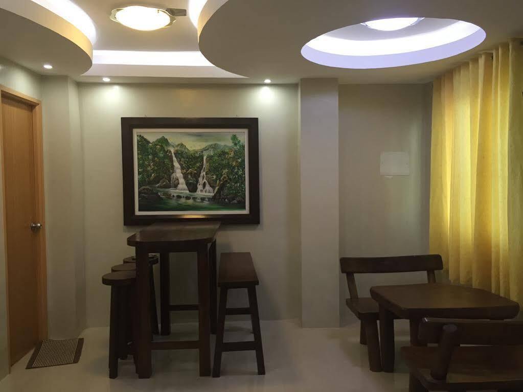 Ea Apartelle - Metro Виган Экстерьер фото